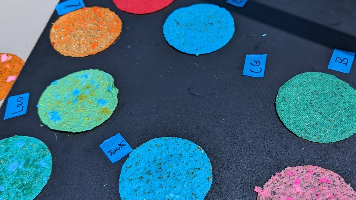 circles of handmade paper on a table