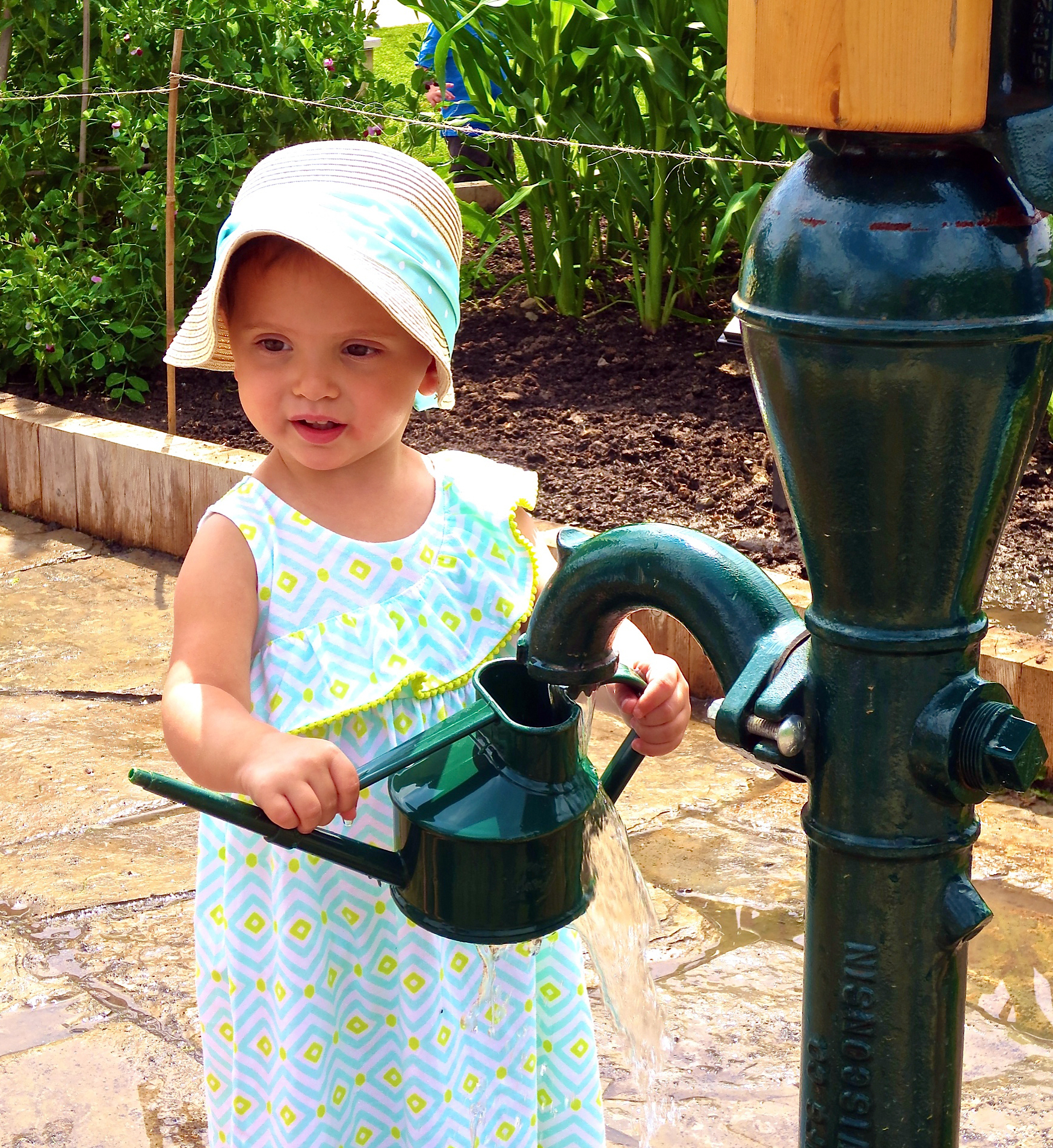 Amelia Heller at water pump - July 2015